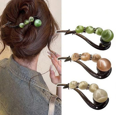 Elegante haarclip met rozen- en parelmotief