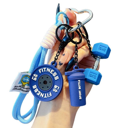 Waarom deze kleine barbell-sleutelhanger jou gaat motiveren