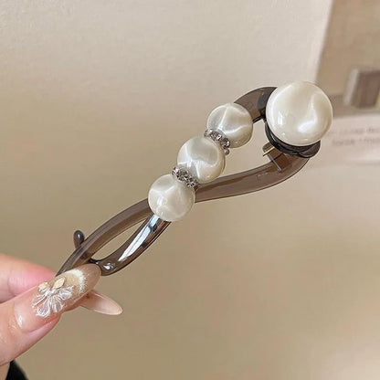 Elegante haarclip met rozen- en parelmotief