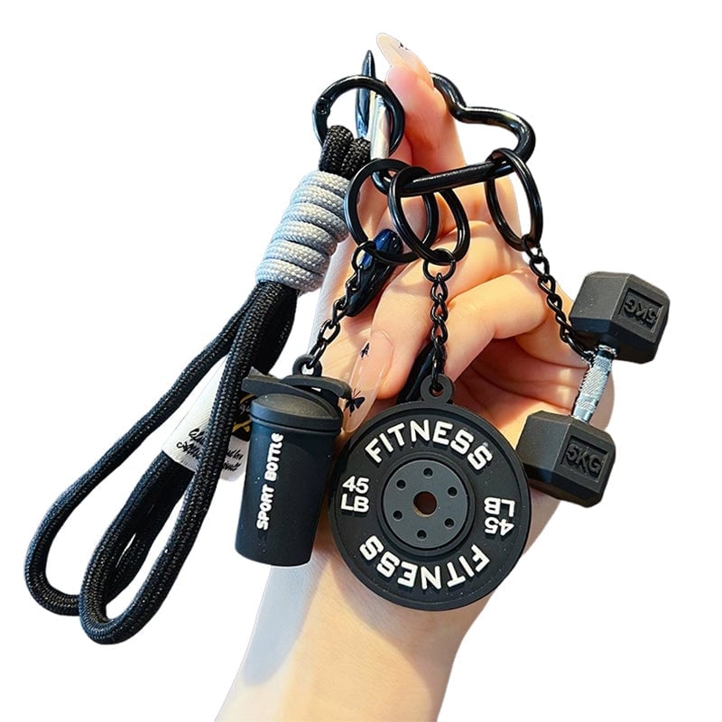 Waarom deze kleine barbell-sleutelhanger jou gaat motiveren