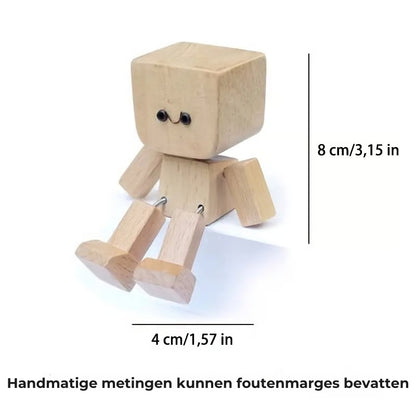 Charmant klein houten schommelfiguurtje met 12 magnetische uitdrukkingen