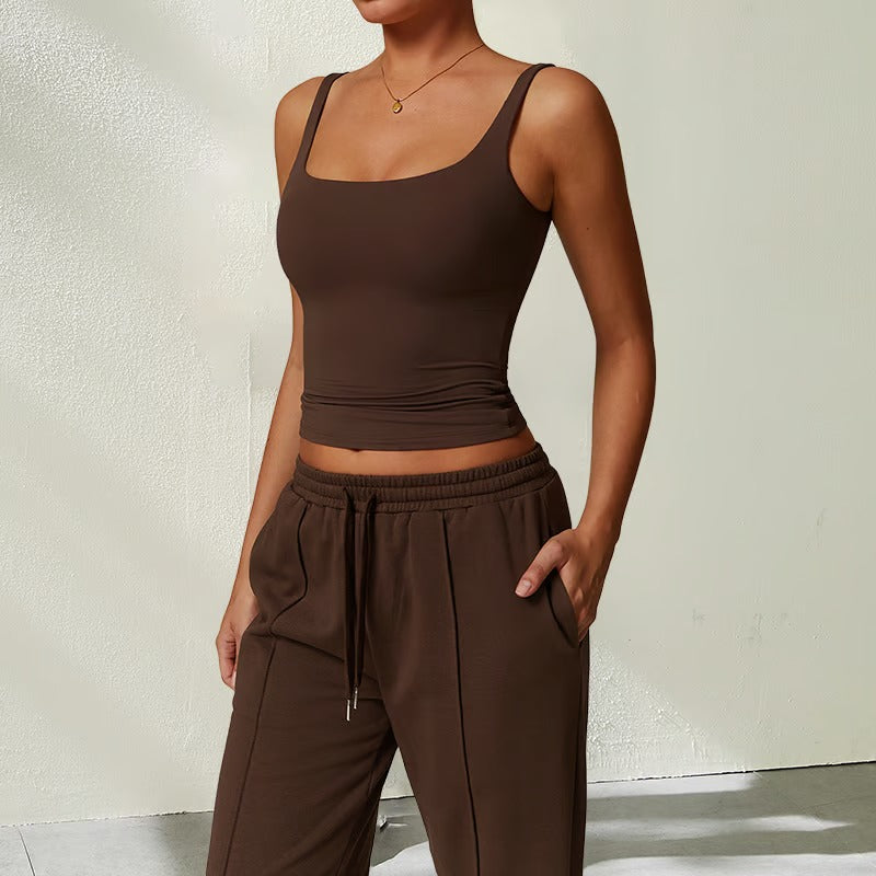 Mouwloze, ademende yogatop met ingebouwde BH