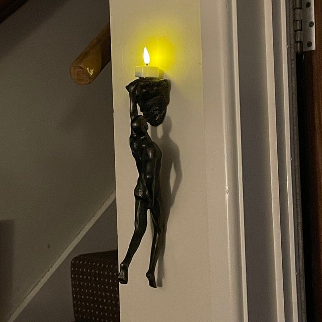 Klimmer sculptuur wanddecoratie